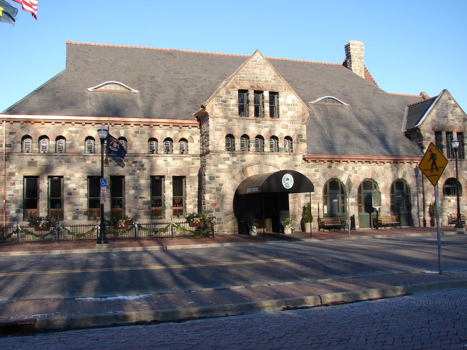 The exterior of a restaurant building and sidewalk